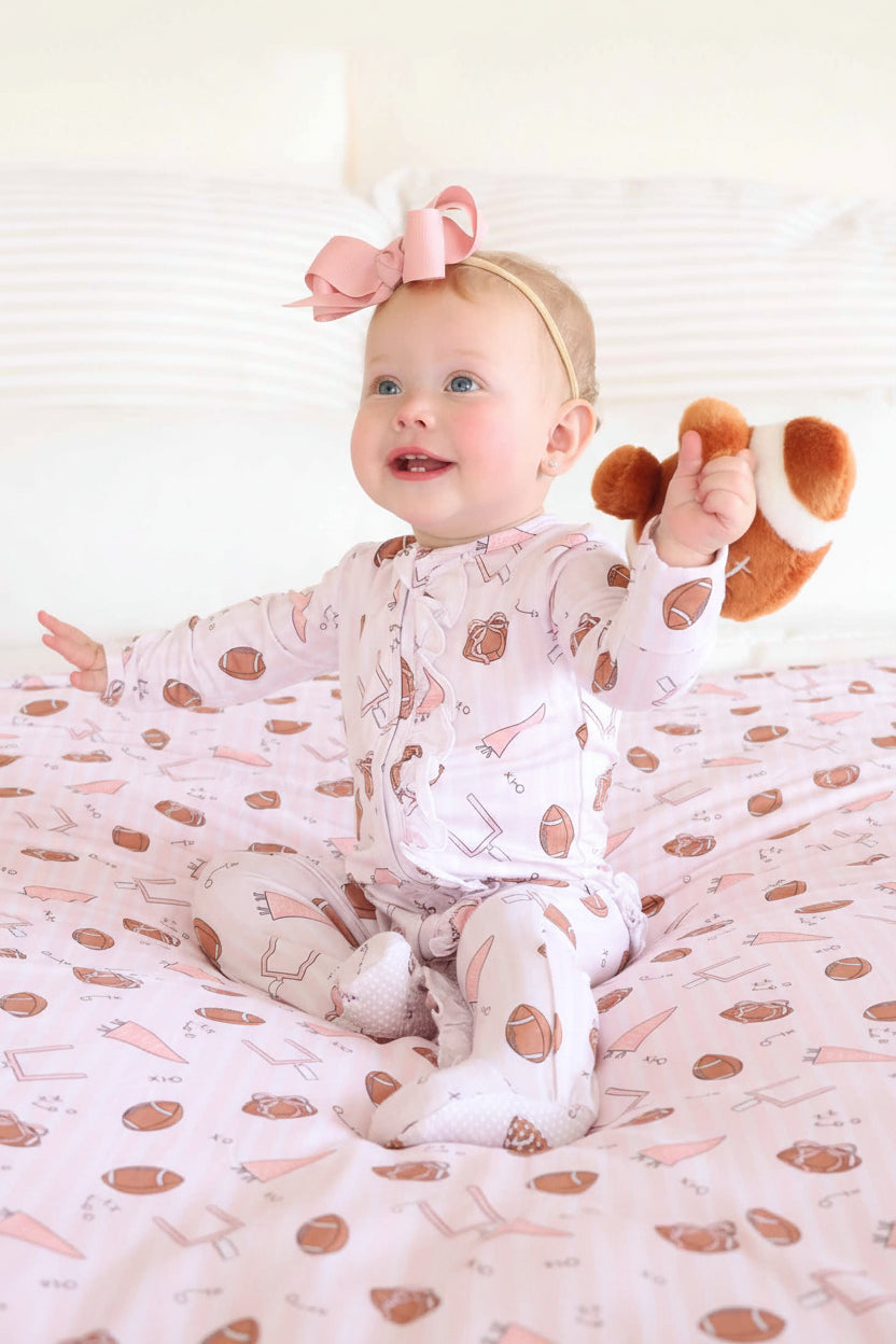 Tiny Touchdowns Ruffle Zipper Footie | Pink